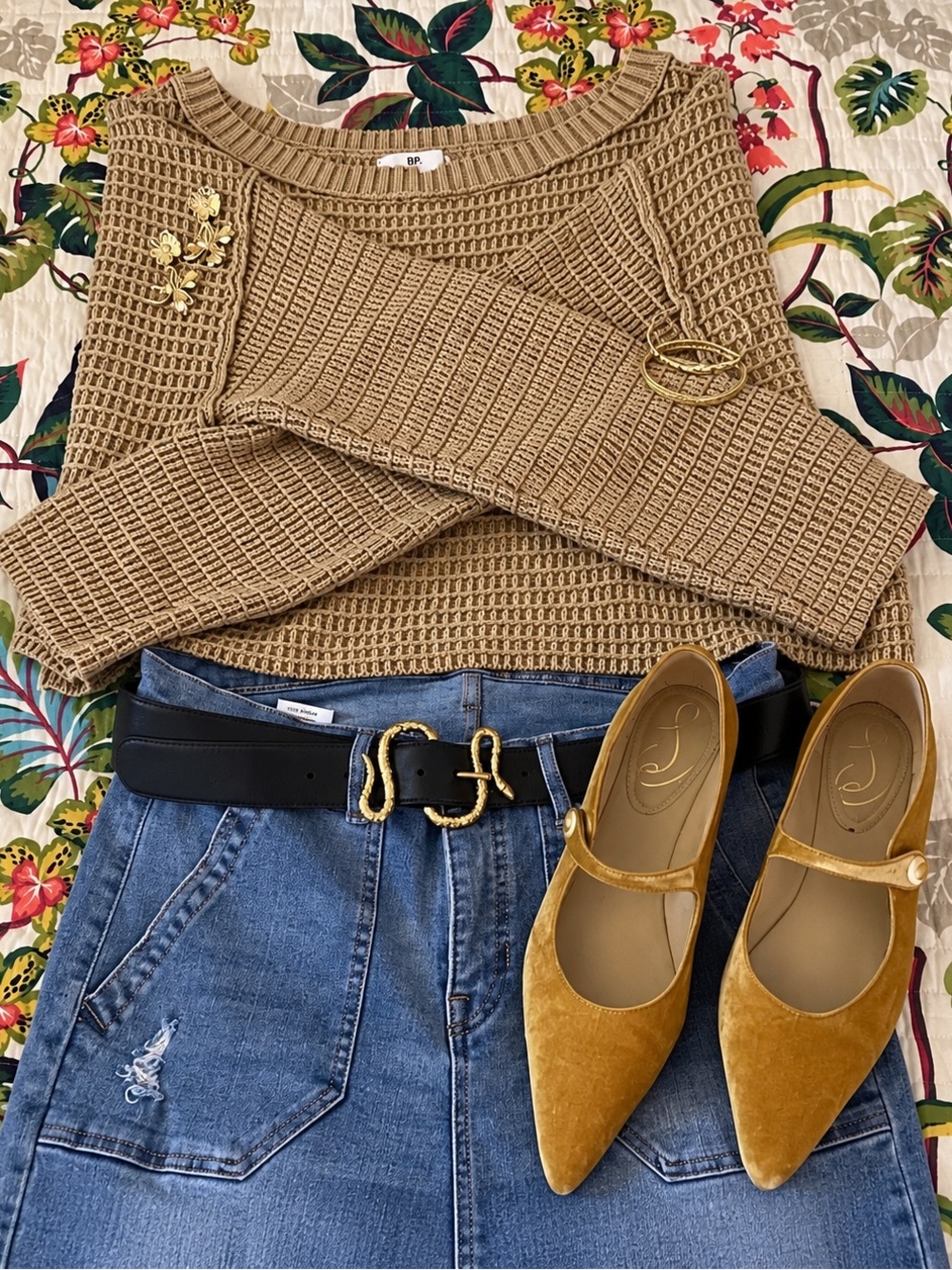 Camel colored Knit Sweater with exposed seams and intentional washed fabric